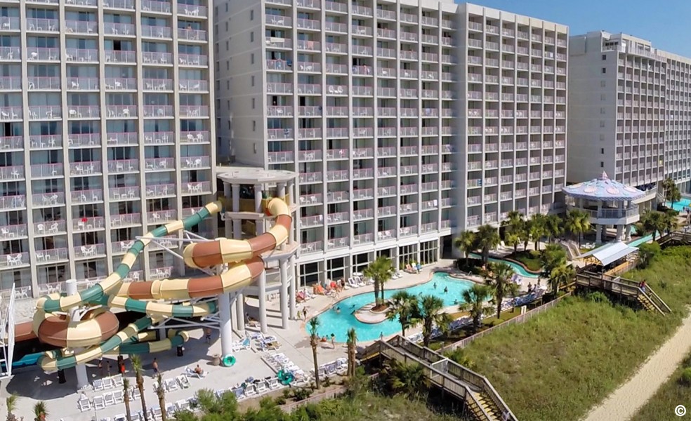 View of the Crown Reef Resort in Mytle Beach South Carolina from the back with Water Park full