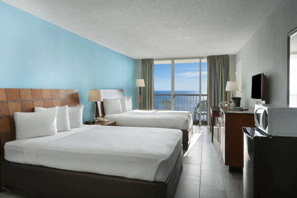 Classic Room with Two Queen Beds Balcony and view of the Ocean at the Crown Reef Resort in Myrtle Beach 1200x800