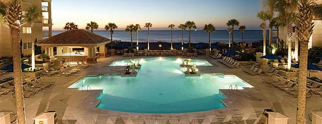 View of the Outdoor Pool in the Evening overlooking the Ocean at the Marriott OceanWatch Villas in Myrtle Beach