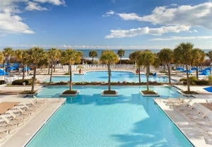 Main Pool separated by Palm Trees Grand Dunes Marriott Resort