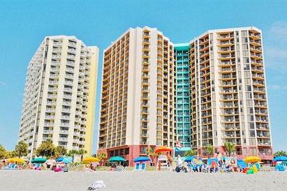 View of the back of the Patricia Grand Resort in Myrtle Beach from the sand